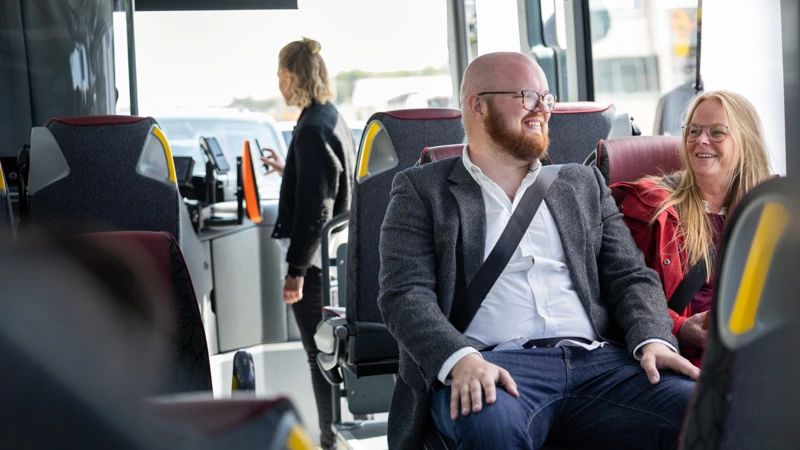 Passagerare i bussen